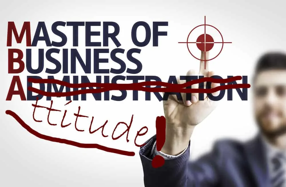Businessman in background drawing with his finger. Master of Business Administration is written, but Administration is crossed out and Attitude written in its place.