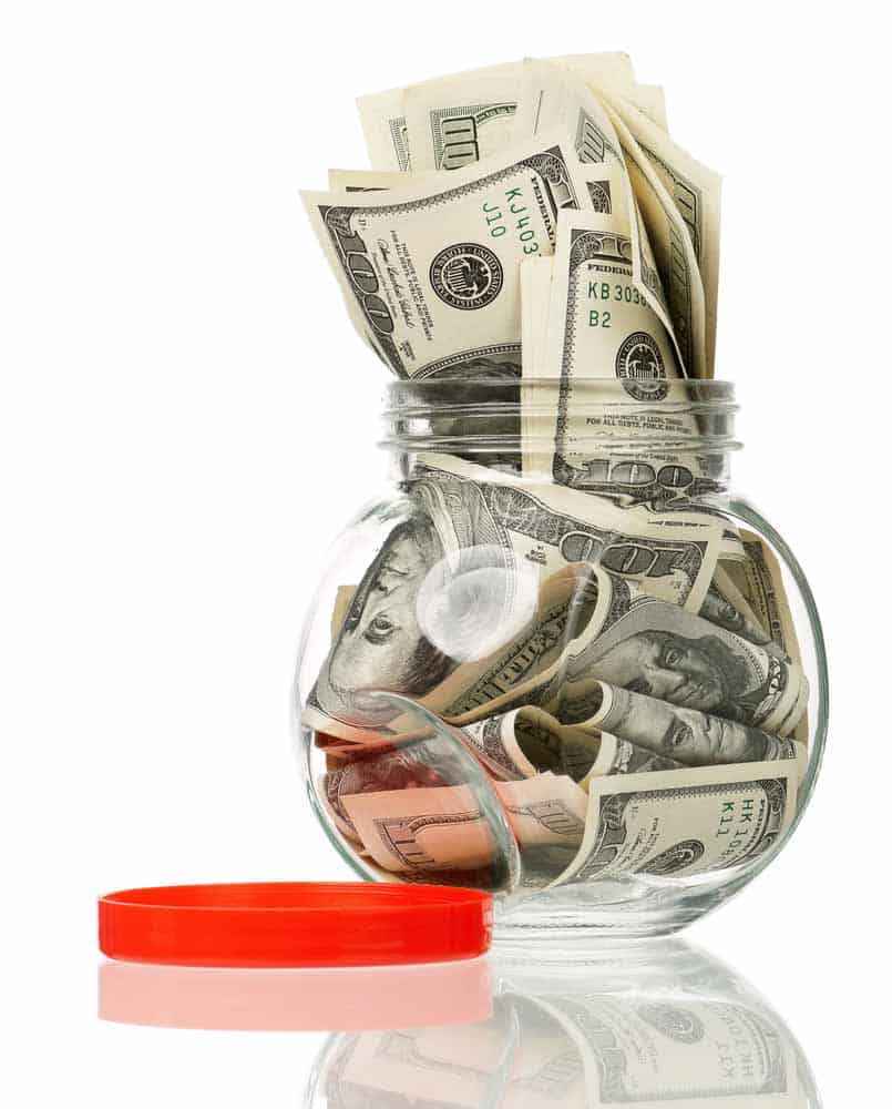 A jar full of cash made up of generous Grubhub customer's tips.