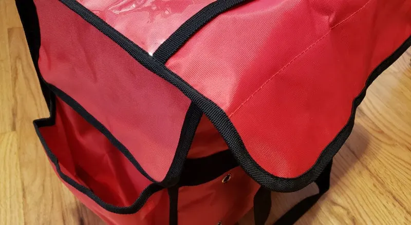 The lid flap folded down on the outside of the bag.