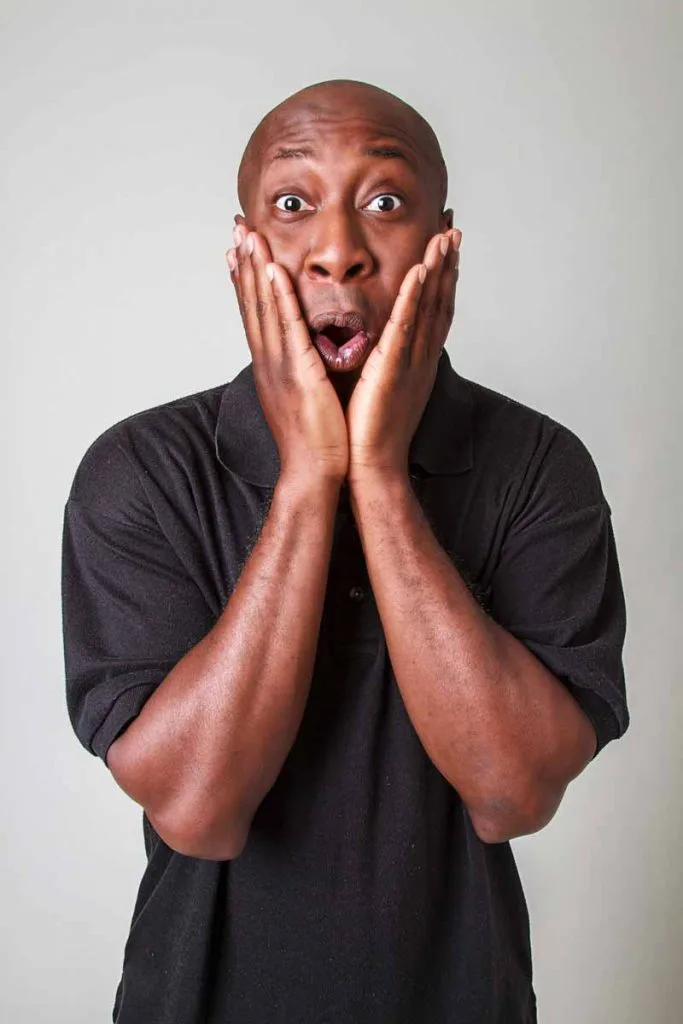 Man with shocked "oh my" expression