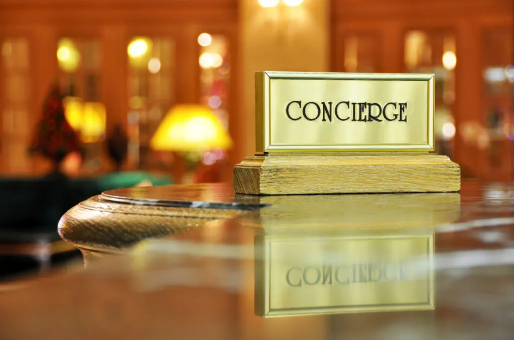 Concierge sign on a nice desk in a luxury hotel or condominium community.